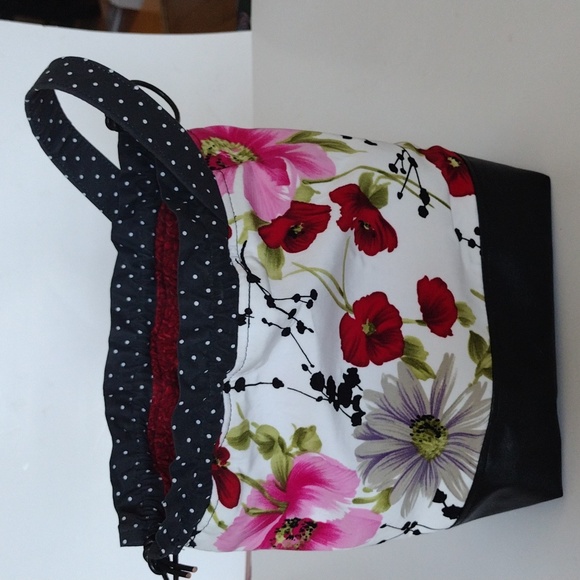 Floral, polkadots, and faux black leather draw string bag - Picture 5 of 6